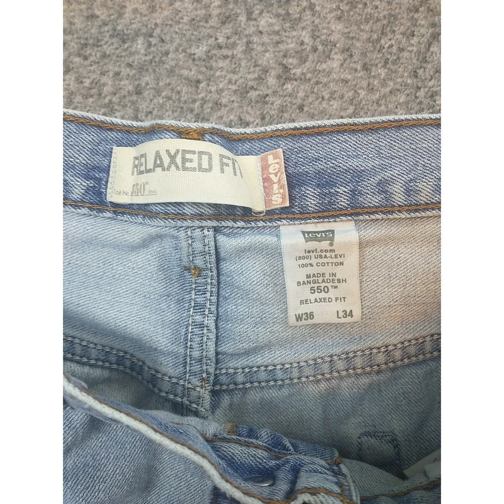 Levis 550 Relaxed Fit Tapered Leg Distressed Jeans Light Wash Mens 34x31 Vintage